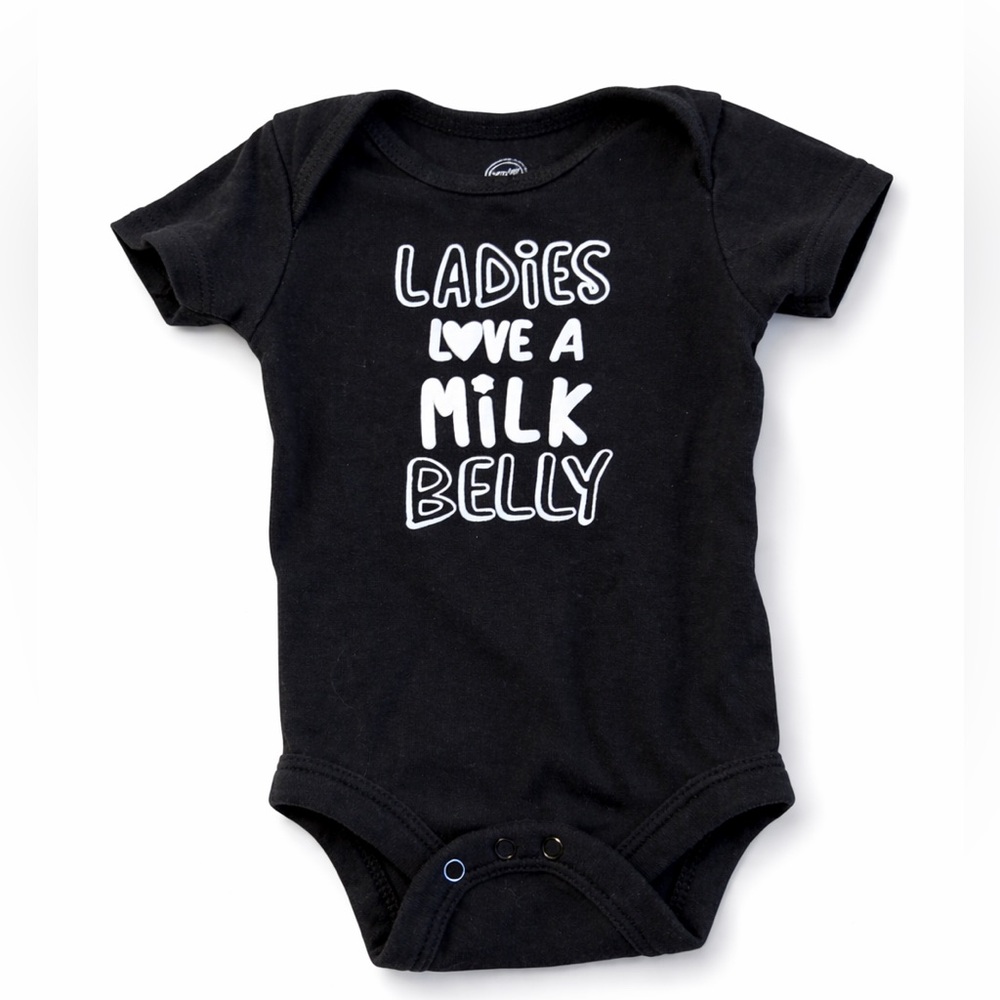 wonder nation Black Baby Bodysuit with White Text “ladies love a milk belly”
